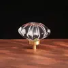 Manija de gabinete de un solo agujero estilo europeo, manija dorada para cajón y puerta de armario, simple decoración de cristal de latón transparente con forma de huevo de paloma