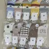 Calcetines de algodón para niños Otoño e Invierno, calcetines de moda de media pantorrilla, calcetines frescos, lindos, de moda universitaria, en stock, venta al por mayor de fábrica