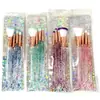 Set de brochas de maquillaje de cuatro piezas con cola de pez, mango de cristal, cerdas suaves, herramientas de belleza brillantes, láser, disponible para venta al por mayor