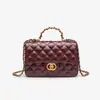 Dropshipping 2025 Nuevo Estilo Bolso Pequeño Estilo Chanel Vintage Acolchado con Cadena Versátil para Hombro Axila Cruzado