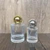 En stock: Botellas de perfume de 30 ml, 50 ml, 100 ml con tapa de rosca, botellas de vidrio transparente, botellas vacías con atomizador para cosméticos
