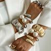 Europa y Estados Unidos joyería transfronteriza pulsera de aleación plisada irregular ins gota de agua cruz perla traje de pulsera