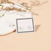 Aretes de cerámica de flor de cinco pétalos aretes frescos originales para estudiantes y chicas nuevo suministro para transmisiones en vivo en línea
