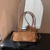 Bolsa feminina bordada artística simples versátil vintage para outono e inverno 2026 bolsa de mão nova bolsa de ombro transversal para o dia a dia