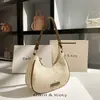 Bolsa de axila bordada de color block vintage para dropshipping, nuevo modelo de verano 2026, bolso de hombro único de alta gama en forma de media luna, venta al por mayor