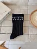 Calcetines de otoño e invierno para mujer, de longitud media hasta la pantorrilla, con un patrón Fair Isle, un estilo coreano sencillo y un diseño trenzado, hechos de algodón puro