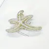 Pinza para el pelo de estrella de mar de perla de diamante de alta calidad estilo coreano moda simple pinza para el pelo personalidad temperamento nicho accesorios para el pelo recogido para mujeres