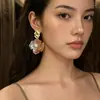 Nuevos aretes de flor de gardenia estilo chino para mujer, ambiente de verano junto al mar, aretes frescos y únicos