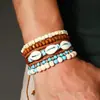 Amazon venta caliente transfronteriza pulsera de cuentas hecha a mano estilo retro para hombre pulsera de línea elástica multicapa con cuentas de madera árbol de la vida