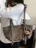Bolso de moda transfronterizo para mujer, nueva colección otoño 2026, bolso de hombro vintage y elegante, bolso de axila, adecuado para ir al trabajo y uso casual, bolso tote
