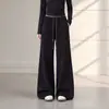 Pantalones de chándal para niña de principios de otoño 2026 Nuevo estilo Pantalones casuales de pierna recta ajustados ligeramente acampanados para niños medianos y grandes Primavera y Otoño Caída Venta al por mayor