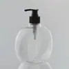 Botella Plana Redonda de 500ml PET Tapa de Aluminio Transparente Botella para Bebidas Té con Leche Bomba de Presión Desinfectante de Manos Loción Botella de Plástico Fabricante
