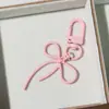 Llavero DIY Creativo de Aleación Hueca con Forma de Lazo con Colgante de Corazón de Colores Encanto para Bolso Corazón Femenino