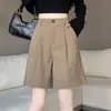 Foto real de pantalones cortos de pana para mujer para otoño e invierno, pantalones de pierna ancha de cintura alta de longitud media, adecuados para personas petite, se pueden usar con botas