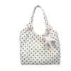 Bolso tote minimalista de lunares transfronterizo para mujer, nueva colección 2026, bolso de mano y bandolera versátil de alta gama de pana