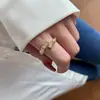 Processamento de fábrica anel personalizado feminino aço titânio não desbota abertura ajustável anel dedo indicador suporte amostra