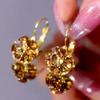 Sensación de alta gama lleno de hebilla de oreja dorada champán combinable elegante exquisito aretes super brillantes moda de lujo