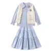 Conjunto de Otoño para Niña Conjunto de Tres Piezas 2026 Nuevo Estilo Chaleco Camisa Falda Lazo Infantil de Otoño Versión Coreana