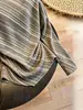 Camiseta de Rayas Melanoides para Mujer 2026 Otoño Temprano Nuevo Estilo Holgada Adelgazante Ropa Interior Superior de Capa Base Irregular