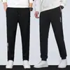 Pantalones casuales para hombre para otoño e invierno, pantalones deportivos tipo jogger de pierna recta, ajuste holgado, pantalones gruesos, versátiles para otoño