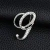 Temperamento de comercio exterior europeo y americano 26 broches de letras inglesas femenina diamante personalidad Joker moda corsage pin masculino accesorios