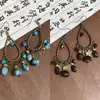 Brincos de Gancho com Pingente de Pedra Padrão de Água Flor Redonda Gota d'Água de Bambu Estilo Étnico Retrô Brincos de Design de Nicho para Mulheres