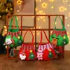 Bolsa de manzana navideña transfronteriza de dibujos animados, bolsa de mano de felpa tridimensional de Santa Claus, bolsa de regalo de tela, bolsa de dulces
