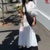 El tamaño ha sido actualizado. Este es un vestido de principios de otoño estilo coreano con un diseño suave y elegante, que presenta un cuello redondo, detalles plisados, un corte holgado y una cintura con cinturón.. Estilo de mujer, 19815