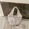 Bolsa de Tela Bordada Bolso de Mano para Mujer Gran Capacidad Múltiples Bolsillos Bolso Cubo para Viajes Diarios Bolso de Tela Simple Nuevo Estilo 2026 Bolso de Hombro