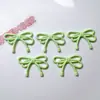 Accesorios de Plástico al por Mayor Accesorios DIY Materiales Hechos a Mano Pasadores Base para Flor de Zapato Material Base Pegamento en Crema Parche Lazo Doble