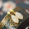 Pendientes de cuerpo entero chapados en plata de ley s925 para mujer, estilo étnico, con forma de hoja de jade Hetian, con temperamento, con gancho para la oreja
