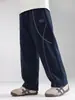 Valle del Viento 2026 Otoño Nuevo Estilo Coreano de Moda Pantalones Deportivos para Niños con Diseño de Costuras Visibles Pantalones Casuales Sueltos Versátiles para Niños
