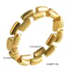 Anillo de Oro de 18K con Enlace de Tejido Hueco Cruzado Anillo Geométrico Hueco de Acero de Titanio Moda Europea y Americana