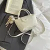 Elegante Bolso Pequeño de Nicho Plateado 2026 Nuevo Bolso Cruzado Informal Estilo Coreano Bolso Cubo ins Bolso de Hombro Único y de Mano