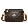 Bolso de hombro cruzado de cuero suave texturizado transfronterizo para mujer, popular en transmisiones en vivo, bolso cruzado simple con múltiples compartimentos, bolso para mamá commuter