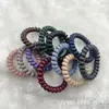 Diadema de línea telefónica transparente directa de fábrica para mujer, cuerda para el pelo, color caramelo colorido, anillo para la cabeza de alta elasticidad, entrega de una sola pieza