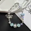 Colgante de cadena para teléfono con lazo de estrella plisado estilo Ins, llavero de alta gama y accesorio para bolso al por mayor