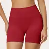 Shorts de yoga seamless de cintura alta cruzada Lycra levantamiento de glúteos realce de cadera pantalones de yoga para exteriores fitness deportivos para mujer 5112