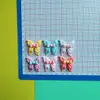 Corbata de moño grande de colores de dibujos animados Mariposa Accesorios para el cabello DIY Pinza para el cabello Funda de teléfono Decoración para zapatos Material de pegamento en crema Accesorios