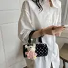 Bolso de lunares de nicho transfronterizo para mujer, nuevo bolso cruzado versátil 2026, bolso de mano de alta gama, bolso almohada, bolso cilíndrico