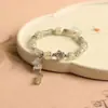 Barraca de Mercado Noturno Gato Verde Limão Gato Uva Verde Pata de Gato Pulseira Portátil de Alto Valor para Mulheres, Pulseira Macia Enrolada no Dedo Torcida à Mão Portátil