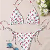 Al por mayor transfronterizo europeo y americano Nuevo estilo Sexy de cuello halter con atar Fresco de vacaciones Bikini de dos piezas sin espalda para mujer