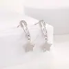 Nuevos Pendientes de Clip para Papel con Forma de Estrella de Diamante Pequeños y Exquisitos Estilo Fresco Femenino Simple Pendientes de Estrella de Cinco Puntas Venta al por Mayor