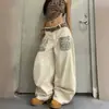 Jeans de pierna ancha holgados hasta el suelo para hombre y mujer, estilo callejero americano, con bolsillos de retazos con estampado de leopardo, dobladillo curvo, con remaches
