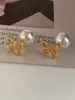 Pendientes de Mariposa de Perlas Retro Franceses para Mujer Lujo Ligero Personalidad Elegante Versátiles Pendientes de Moda de Gama Alta Pendientes
