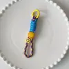 Nova Corrente Criativa para Capa de Celular Dopamina Bolsa Universal Coringa Corrente Curta de Mão Forte Portátil Corda Sorridente Anti-perda