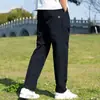 Primavera/Verão 2025 Secagem Rápida Três-Resistentes Estilo Japonês Leve Fresco Casual Calças Roupa de Trabalho Cintura Elástica Pequeno Logo Triangular Estilo Outdoor Americano