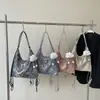 Bolso grande de mujer popular transfronterizo, moderno y de alta gama, con detalle de lazo, mochila de un solo hombro y de doble hombro, bolso de axila de diseño nicho