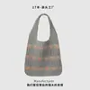 Bolso de Mano de Punto con Corazón 2026 Otoño e Invierno Nuevo Moda Estudiante Elegante Hueco Bolso Cruzado al Hombro para Mujer