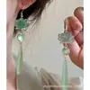 Novos Brincos de Lótus Chineses Cool High-end 2024 Feminino Novo Cheongsam Antigo Passo a Passo Lótus Orelha Gancho Orelha Jóias